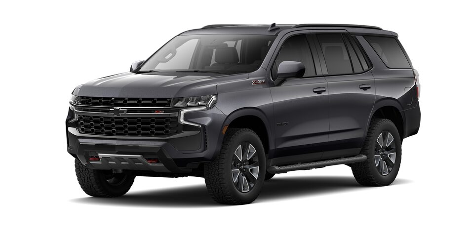 Chevrolet Tahoe 2024, SUV con 3 filas de asientos en color gris asfalto metálico